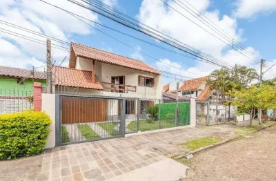 Casa residencial de 3 dormitórios, sendo 1 suíte, no bairro partenon.