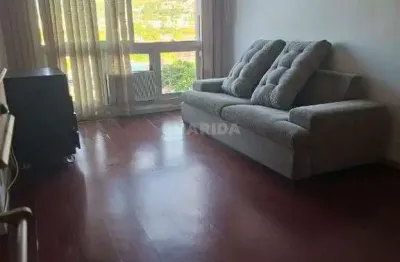 Apartamento semi mobiliado com 2 dormitórios e 1 vaga de garagem no bairro Cristal