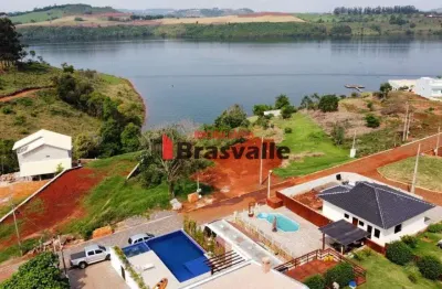 Terreno a venda no condomínio condomínio sol e lua no bairro condominio sol e lua - boa vista da aparecida/pr