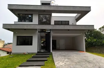 Casa de luxo em condomínio no bairro Cacupé, 4 quartos e 3 suítes, 340m² - Florianópolis-SC