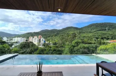 Imóvel de luxo com 4 suítes e 457m² no itacorubi, florianópolis-sc. venha conhecer sua nova casa!