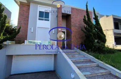 Imóvel exclusivo na lagoa da conceição: casa com 5 suítes, 3 salas, 7 banheiros e 4 vagas de garagem, florianópolis-sc