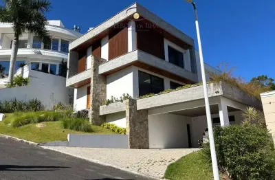 Imperdível casa à venda em florianópolis-sc, no charmoso bairro cacupé: 3 quartos, 3 suítes, 5 banheiros, 6 vagas de garagem.