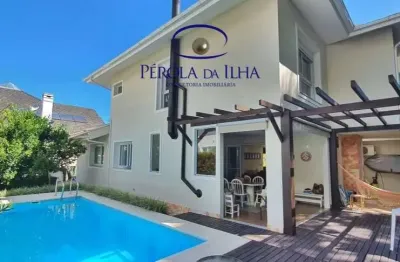 Casa em condomínio de luxo em cacupé - florianópolis-sc: 4 quartos, 3 suítes, 3 salas, 5 banheiros, 4 vagas, 330m².