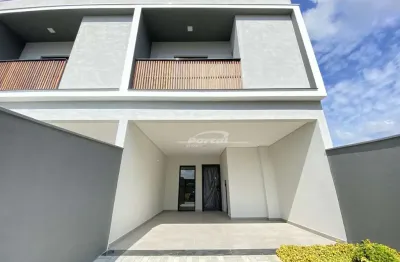 Sobrado com 2 suítes e 2 vagas de garagem, no bairro gaspar mirim em gaspar!