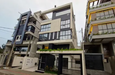 Apartamento garden com 2 suítes e duas vagas no constantine residencial - praia canto grande mar de fora/mariscal, em bombinhas. apto térreo duplex com jardim.