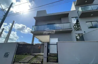 Sobrado semimobiliado com 3 dormitórios ,sendo 1 suíte, em condomínio, no bairro itacolomi, em balneário piçarras!