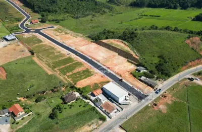 Lotes com financiamento direto com a loteadora, no loteamento vento terral, no bairro santa terezinha em gaspar!