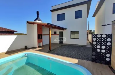 Sobrado alto padrão, com 4 dormitorios sendo 1 suite, bairro centro em barra velha, distância da praia 1,8km (18418)