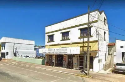 Prédio comercial com amplo terreno bem localizado no bairro budag, distante 700 metros da prefeitura municipal. corredor de serviço.