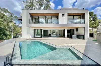 Condomínio são paulo ii - casa alto padrão no condomínio são paulo ii - zero km, 4 suítes, mobiliada e decorada!
