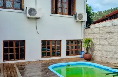 Casa com 3 quartos à venda na rua maestro mendanha, 119, jardim dos lagos, guaíba por r$ 580.000
