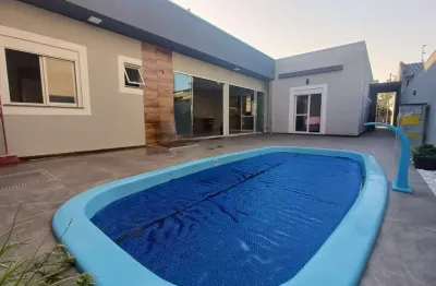 Casa com 4 quartos à venda na rua república do piratini, 135, jardim dos lagos, guaíba por r$ 898.000