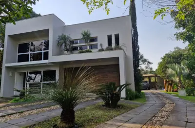 Casa em condomínio fechado com 4 quartos à venda na borregard, 355, alegria, guaíba por r$ 1.990.000