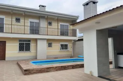 Casa com 4 quartos à venda na rua província de são pedro, 144, jardim dos lagos, guaíba por r$ 620.000