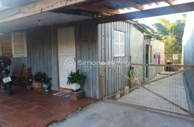 Casa com 2 quartos à venda na condominial roma, 186, jardim dos lagos, guaíba por r$ 140.000