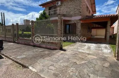 Casa em condomínio fechado com 4 quartos à venda na Otavio Rabelo Cesar, 86, Morada da Colina, Guaíba por R$ 1.330.000