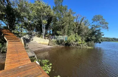 Terreno frente  ao rio guaraguaçu - em condomínio náutico - com rampas e deck.