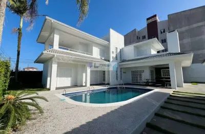 Belíssimo sobrado de esquina - balneário ipanema - a poucos metros da praia.