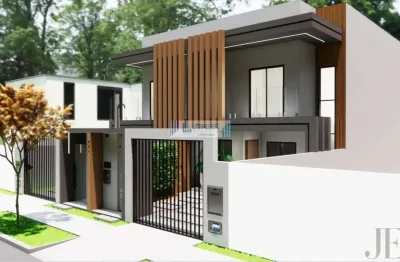 Sobrado com excelente acabamento- 3 dormitórios/suíte - piscina e churrasqueira.