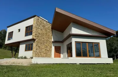 Condomínio jardim da serra - casa com 04 dormitórios em rancho queimado