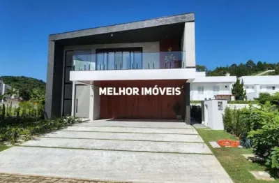 Horizontal praia brava - casa nova em condomínio fechado à venda com 5 suítes, 6 vagas de garagem localizada na praia brava .