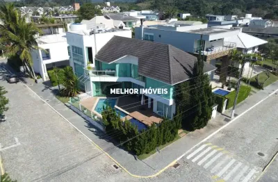 Vivendas do atlântico - casa alto padrão á venda com 4 suítes com vista mar localizada na praia do estaleiro em balneário camboriú.