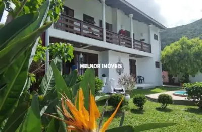 Casa à venda com 05 suítes , localizada na praia de taquaras em balneário camboriú - sc