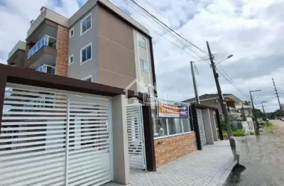 Apartamento em itapoá, 2 quartos sendo 1 suíte e ampla sacada com churrasqueira