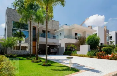 Casa alto padrão com 4 suítes à venda, 400 m² de área construída por r$ 4.950.000 - lorian boulevard - osasco/sp