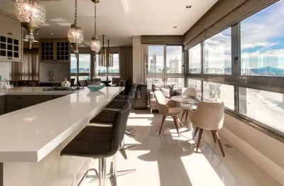 Apartamento mobiliado frente mar com 4 suítes para locação anual no ed. apogee em balneário camboriú
