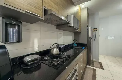 Apartamento com dois dormitórios à venda no ed. rio madeira em camboriú
