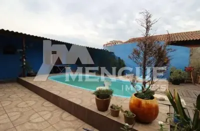 Casa com 4 quartos à venda na rua ararás, 492, sarandi, porto alegre por r$ 585.000