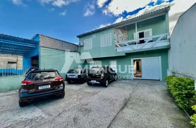 Casa com 5 quartos à venda na rua rodrigues da costa, 34, sarandi, porto alegre por r$ 950.000