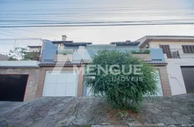 Casa com 3 quartos à venda na rua arnaldo ballve, 705, jardim itu sabará, porto alegre por r$ 600.000