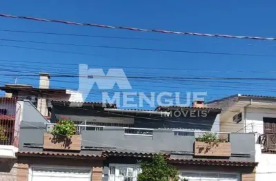 Casa com 3 quartos à venda na rua arnaldo ballve, 705, jardim itu sabará, porto alegre por r$ 600.000