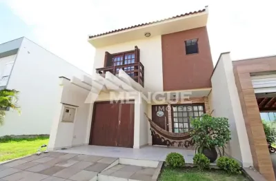 Casa em condomínio fechado com 3 quartos à venda na rua deputado hugo mardini, 1780, passo das pedras, porto alegre por r$ 878.000