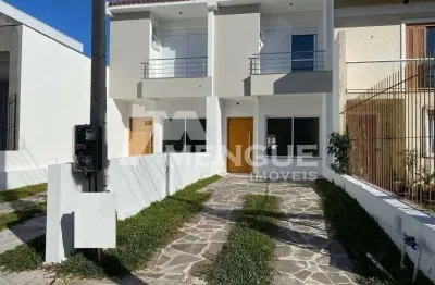 Casa com 3 quartos à venda na rua itacyr rossi, 190, guarujá, porto alegre por r$ 499.000