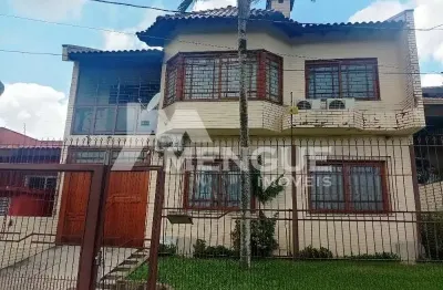 Casa com 3 quartos à venda na rua general telino chagastelles, 245, parque santa fé, porto alegre por r$ 1.200.000