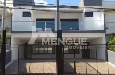 Casa com 3 quartos à venda na rua lagoa do peixe, 95, ecoville, porto alegre por r$ 980.000
