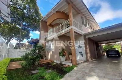 Casa com 3 quartos à venda na rua engenheiro frederico dahne, 525, sarandi, porto alegre por r$ 790.000