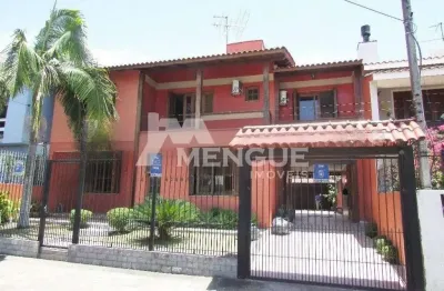 Casa com 4 quartos à venda na rua dom jaime de barros câmara, 276, sarandi, porto alegre por r$ 950.000