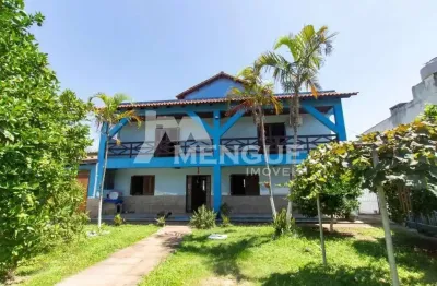 Casa com 4 quartos à venda na campanha, 15, jardim itu sabará, porto alegre por r$ 1.950.000