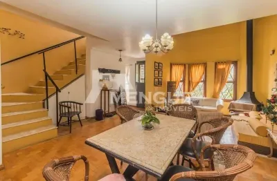 Casa com 3 quartos à venda na rua gomes de freitas, 462, jardim itu sabará, porto alegre por r$ 900.000