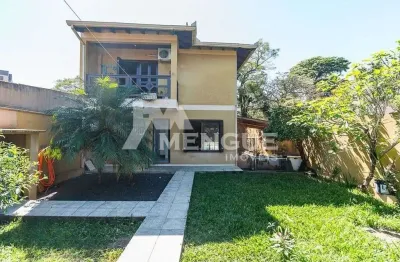 Casa com 3 quartos à venda na rua eugênio du pasquier, 283, cristo redentor, porto alegre por r$ 980.000