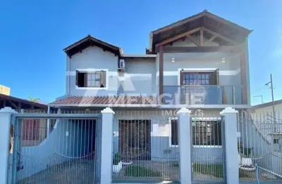 Casa com 4 quartos à venda na rua corrêa de mello, 1060, sarandi, porto alegre por r$ 890.000