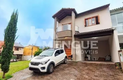 Casa em condomínio fechado com 3 quartos à venda na rua deputado hugo mardini, 1780, passo das pedras, porto alegre por r$ 680.000