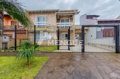 Casa com 3 quartos à venda na rua maria elaine wotter, 46, parque santa fé, porto alegre por r$ 749.000