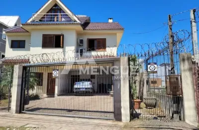 Casa com 4 quartos à venda na alameda três de outubro, 755, sarandi, porto alegre por r$ 2.500.000