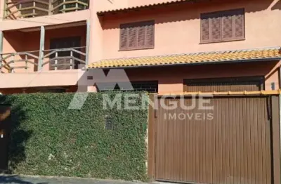 Casa com 7 quartos à venda na rua tuparaí, 21, passo da areia, porto alegre por r$ 1.450.000